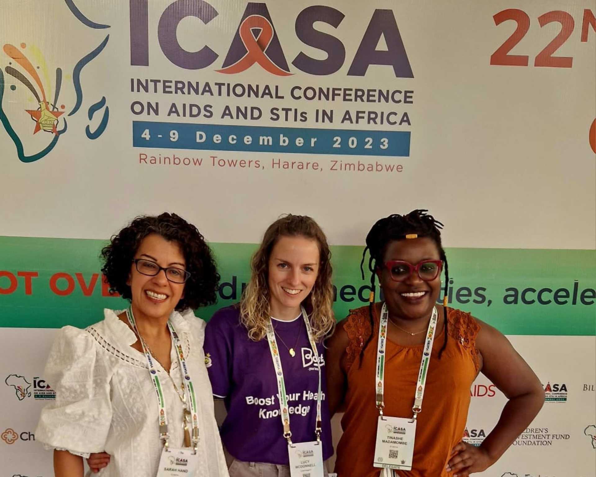 Picture of the Avert team at ICASA 2023 - Sarah Hand, Lucy Gale and Tinashe Madamombe